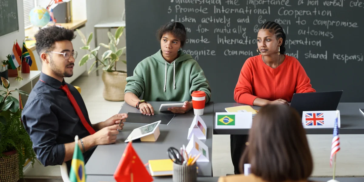 students-listening-to-male-teacher-at-school-2024-09-27-00-02-57-utc